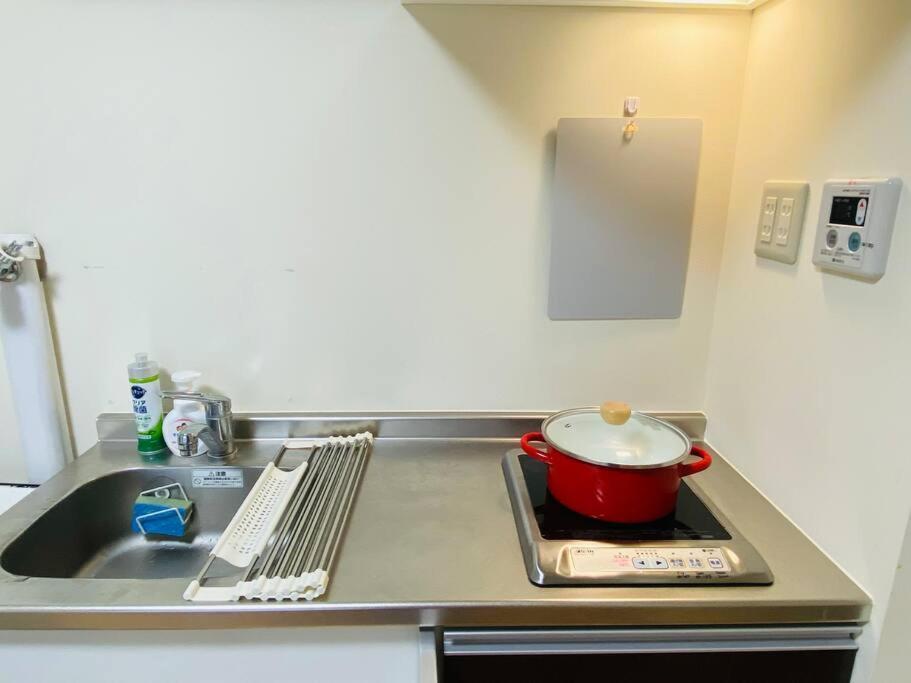 Apartment 【広々一軒家】帰国者歓迎！最大9名!空港直通＆山手線すぐ！ファミリー向け80m2庭付き大福ハウス Tokyo